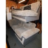 A grey snakeskin effect and corded fabric corner sofa.