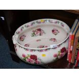 A ironstone pink rose wash bowl.