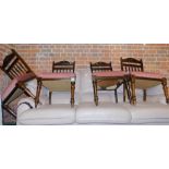 A set of four Victorian mahogany dining chairs.