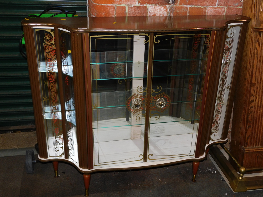 A 1960's glazed and gilt decorated china cabinet.