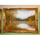 A continental oil on canvas of a forest and mountain landscape, gilt framed.
