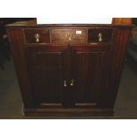 An early 20thC pine corner side cabinet, later converted to a television stand.