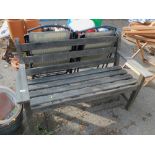 A teak garden bench, together with four folding garden chairs. (5)