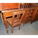 An early 20thC mahogany desk, together with a chair. (2)