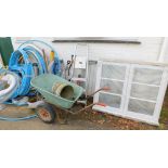 Plastic piping, garden tools, ladder, wheelbarrow, window (new and sealed), etc. (a quantity)