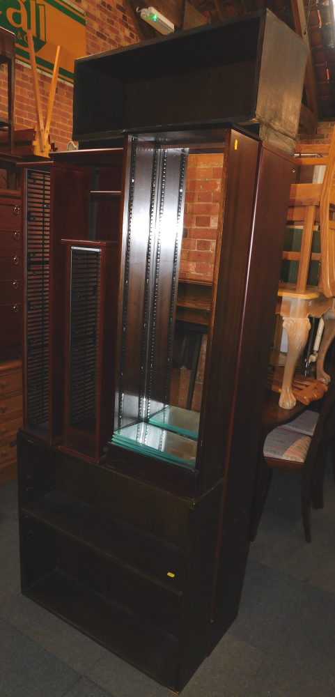 A mahogany effect bookcase, together with three CD racks, etc. (6)