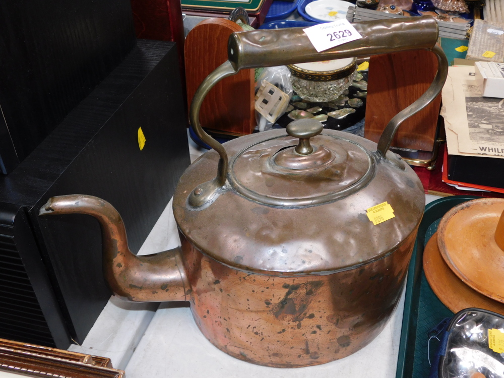 A copper kettle.