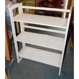 A painted folding bookcase.