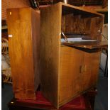 A walnut bookcase, with sliding glass doors, together with an oak bureau stamped 'Criterion', Phoeni