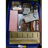 Trinkets, coins and bank notes, a money box tin, book marks, etc. (1 tray)