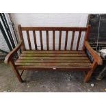 A teak garden bench.