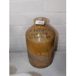 An M Watchorn Red Cow Donington stoneware bottle.