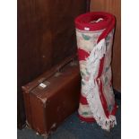 A tan leather travel trunk and a Chinese carpet. (2)