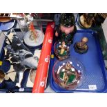 A group of military related items, to include two glass models of Spitfires, in domed case, and a Ro