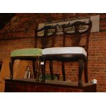 A pair of Edwardian mahogany nursing chairs.