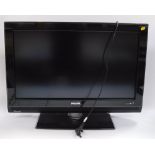 A Phillips 30" flat screen television, with remote control.