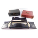 A red morocco casket form fork box, 25cm wide, a purple leather handkerchief wallet, with gilt monog