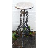 A Coalbrookdale style cast iron and marble topped garden table, 80cm high.