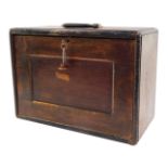 A Neslein 1940's oak engineer's cabinet, of rectangular section with a carrying handle, the drop fla