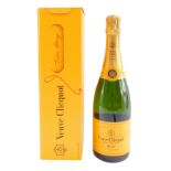 A bottle of Veuve Clicquot champagne, boxed.