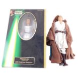 A Hasbro Star Wars figure of Princess Leia, 1999 portrait edition, with ceremonial gown, boxed, toge