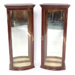 A pair of Victorian mahogany bow front shop display cabinets, with glass panelled sides and door, mi