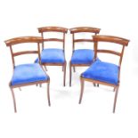 A Regency harlequin set of seven mahogany dining chairs, with blue velour drop in seats, comprising