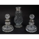A Victorian cut glass sugar sifter, with silver lid, London 1847, together with a pair of 19thC cut