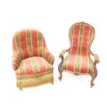 A Victorian mahogany spoon back nursing chair, upholstered in red and green striped fabric, with fol