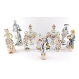 A group of 19thC and later porcelain figures, chiefly gallants and ladies, together with a pa