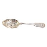 A Victorian silver fruit spoon, fiddle and shell pattern with engraved decoration, John Aldwinckle a
