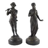 A pair of spelter late 19thC figures modelled as Daphnis and Chloe, raised on black marble socles, s