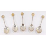 A set of five silver teaspoons, with silver gilt terminals, repousee decorated with flowers, Sheffie