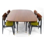 A G-Plan 1950's teak drop leaf dining table, 71cm high, 132cm wide, 107cm, extended, 46cm deep, toge