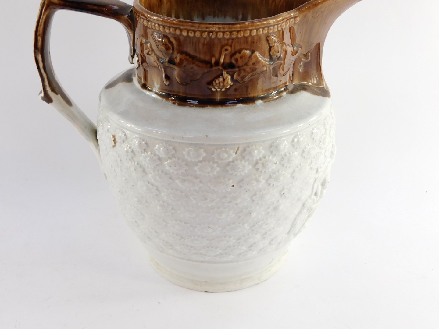 A Staffordshire mid 19thC two tone pottery water jug, moulded with a reserve of mythological figures - Image 2 of 4