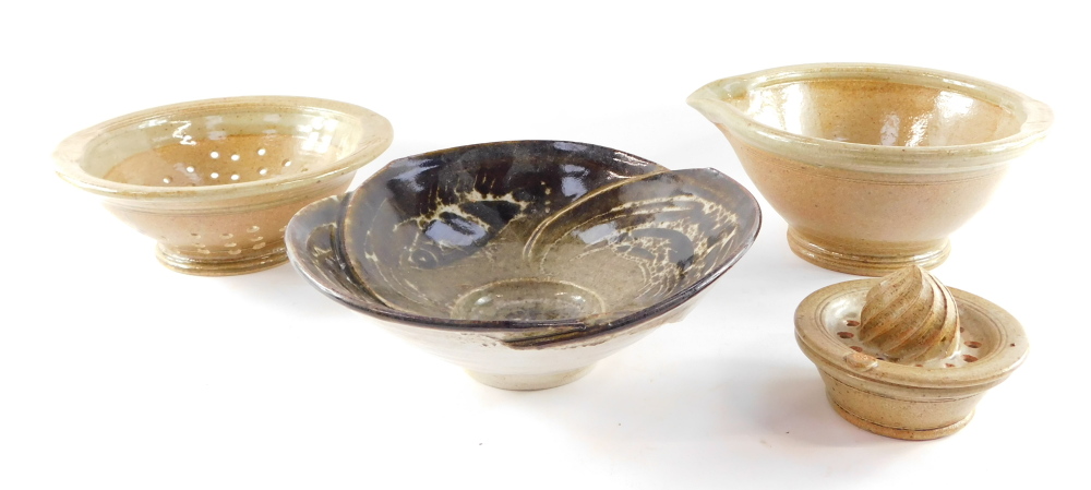 A studio pottery collander and bowl, by A & J Young, Gresham., together with a lemon squeezer, and a