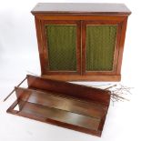 A Regency rosewood chiffonier, the brass galleried top over a mirrored back with single shelf, over