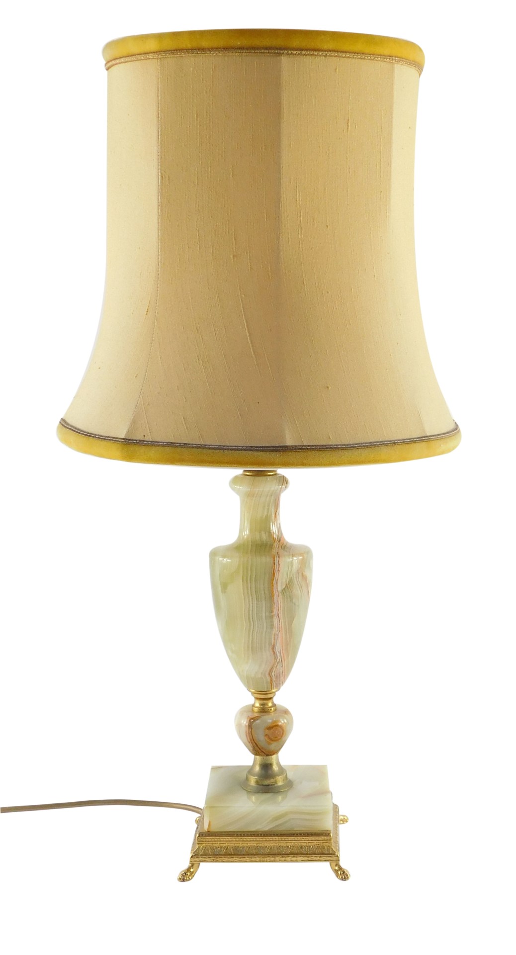 An onyx and brass table lamp, of baluster vase shape form, raised on a square base, with shade, 63cm