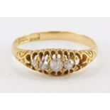 An 18ct gold and rose cut diamond five stone ring, one diamond lacking, approx &#8539? ct, size L, 2