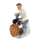 A Royal Doulton figure modelled as The Lobster Man, HN2323.