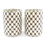 A pair of Tiffany style cylindrical lamp shades, decorated with lattice work and red cabochons, 22.5