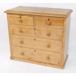 A Victorian pine chest of two short over three long graduated drawers, raised on a plinth base, 93cm