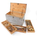 A Victorian painted pine carpenter's tool chest, opening to reveal three trays and an assortment of