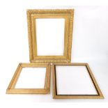 A 19thC gilt wood and gesso picture frame, aperture 81cm x 59cm, frame 105cm x 93cm, another with a