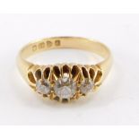 An 18ct gold and rose cut diamond three stone ring, approx &#8540? ct, size O, 4.5g.