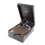 A HMV black cased table top gramophone, 16cm high 29cm wide 41cm deep.