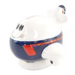 A British Airways pottery novelty money box, modelled as a cartoon jumbo jet, circa 1987, printed ma