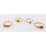 Three 9ct gold and gem set rings, various sizes, 3.2g, and a further ring. (4)