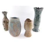 Four studio pottery vases by Karen Cohen, each with incised decoration, bears labels, 27cm-40cm.