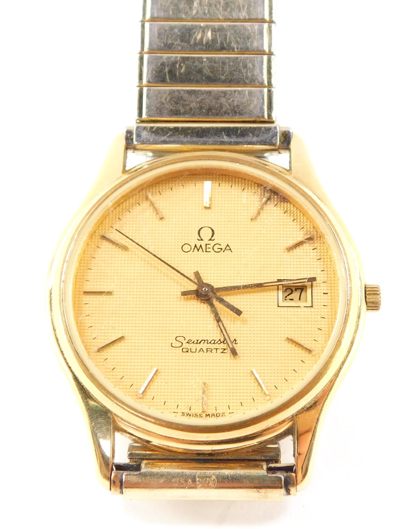 An Omega Seamaster gentleman's gold plated wristwatch, circular dial with centre seconds, date apert